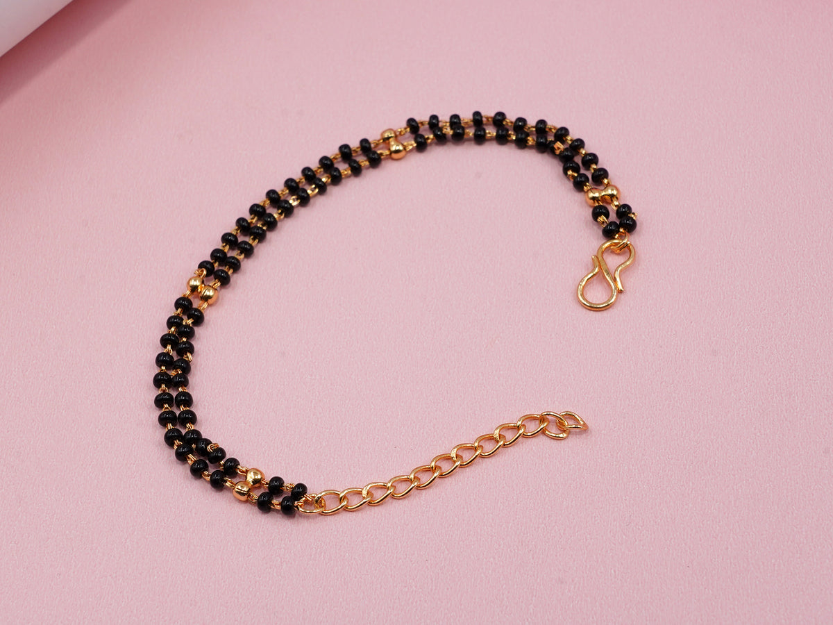 JHB Gold Plated And Black Bead Hand Mangalsutra Bracelet For Women