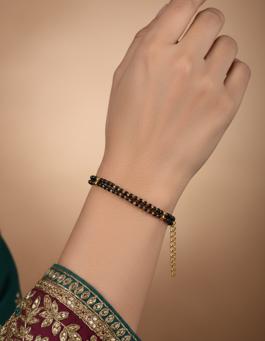 JHB Gold Plated And Black Bead Hand Mangalsutra Bracelet For Women