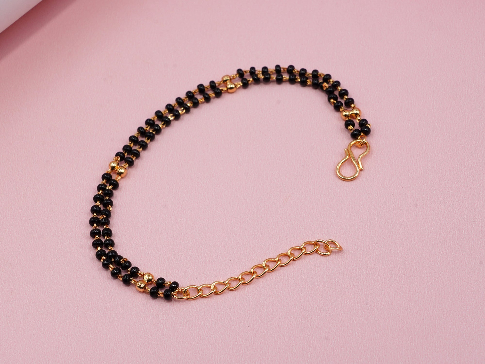 JHB Gold Plated And Black Bead Hand Mangalsutra Bracelet For Women