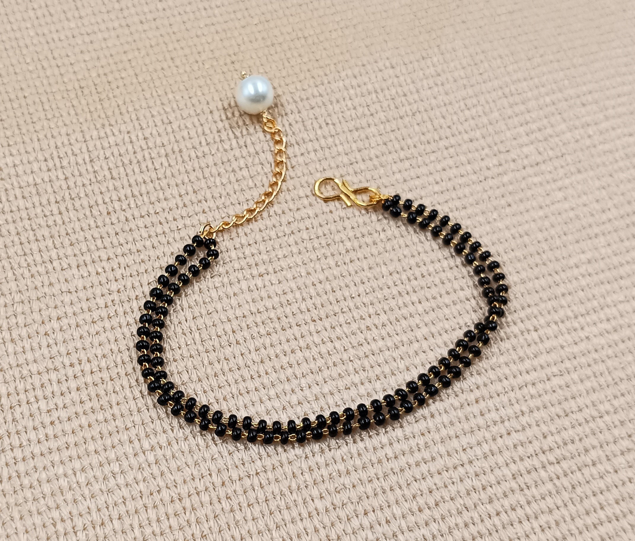 JHB Gold Plated Black Bead Mangalsutra And Bracelet Combo For Women