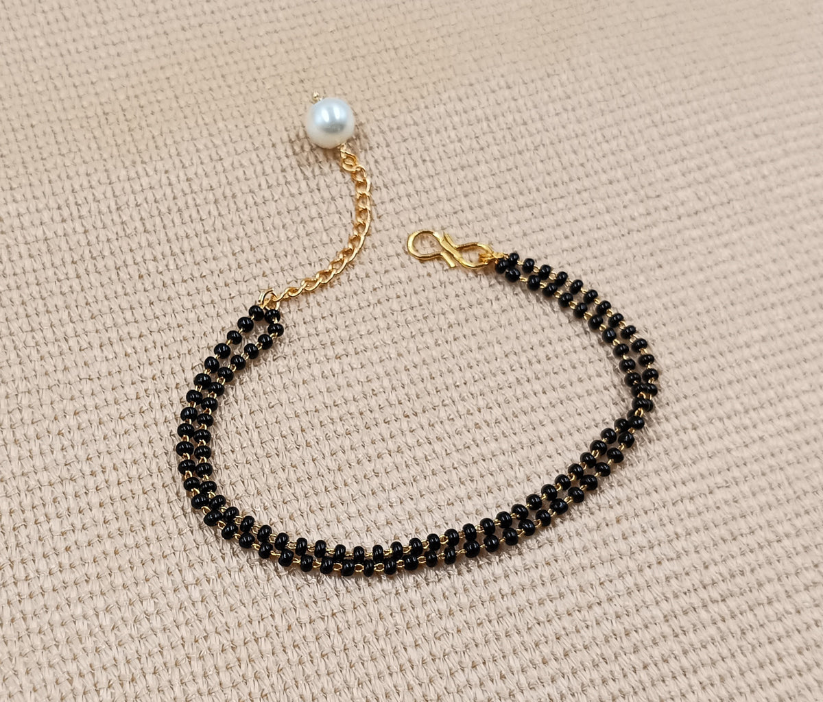 JHB Gold Plated Black Bead Mangalsutra And Bracelet Combo For Women